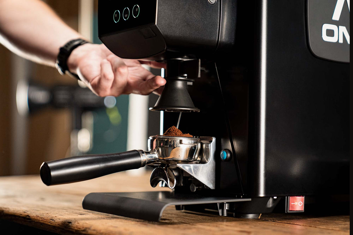 Sanremo X-One grinding directly into a portafilter